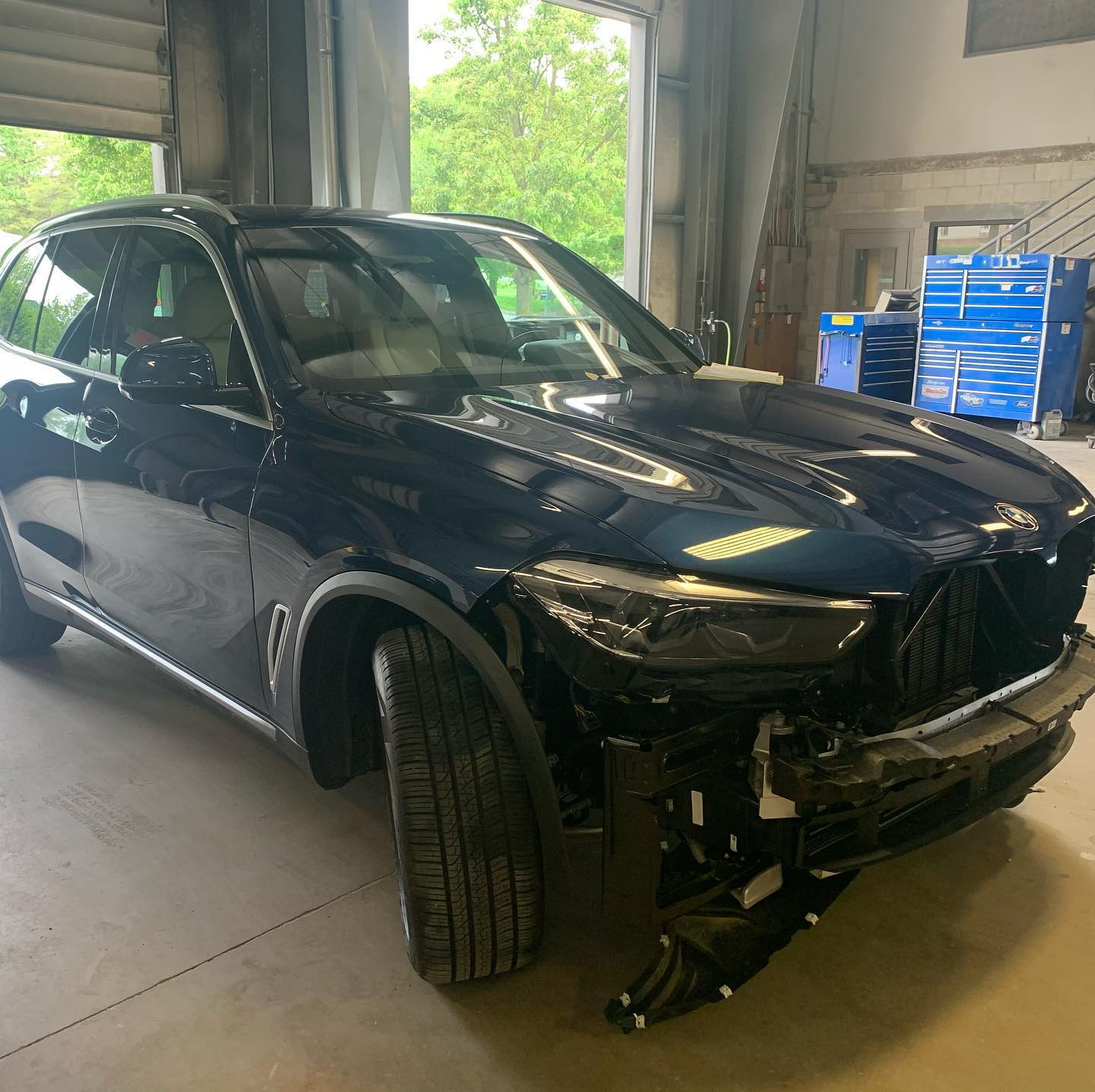 BMW collision damage — before repair