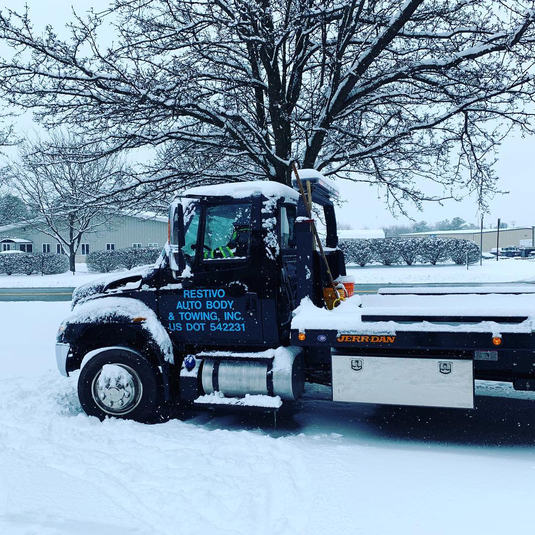 Restivo tow truck on a winter call